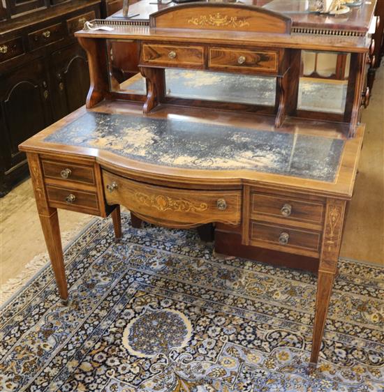 An Edwardian inlaid and strung rosewood bonheur du jour, W. 3ft 6in. D. 1ft 10in. H. 3ft 8in.